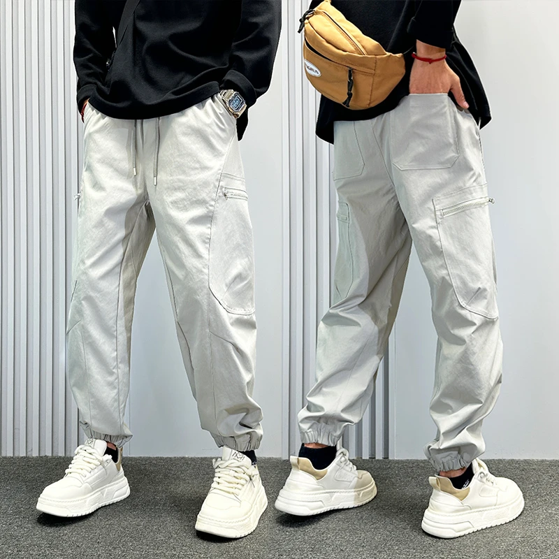 美式潮牌多口袋束脚工装裤男款秋冬季户外软壳冲锋裤子男士休闲裤