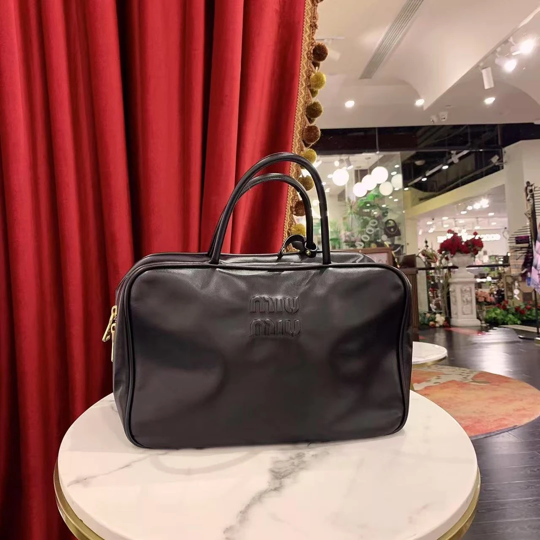 95新 MIU MIU/缪缪 GGS丨保龄球大号黑金牛/12313253