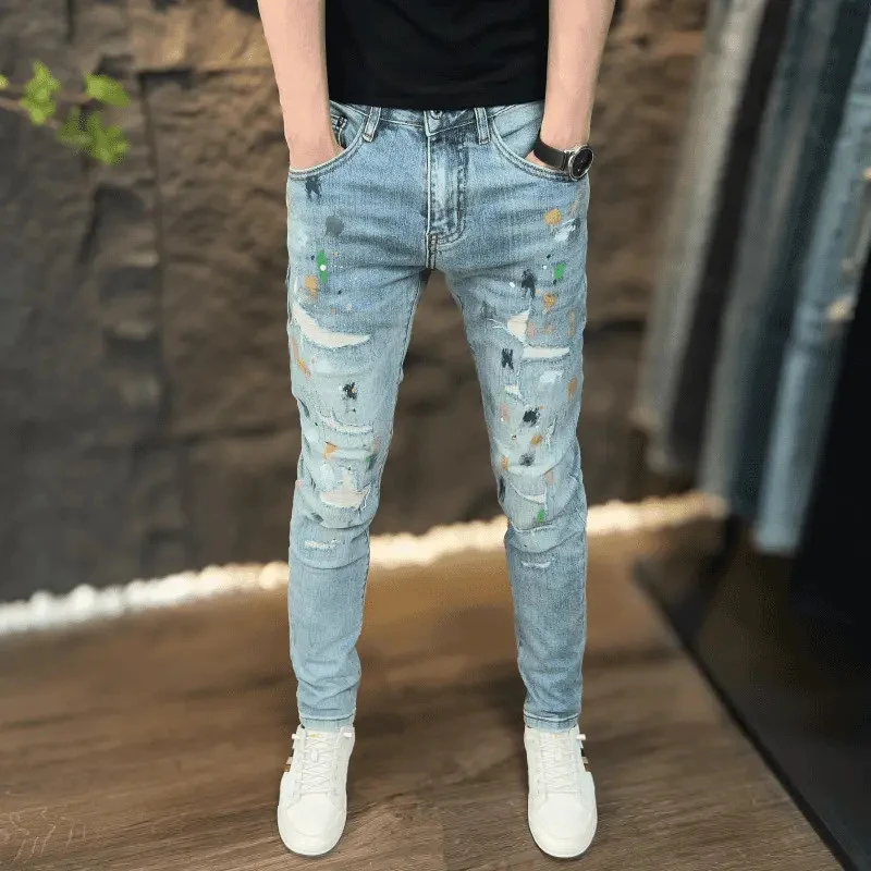秋季新款破洞潮流牛仔裤子男修身百搭弹力时尚小脚裤水洗印花长裤