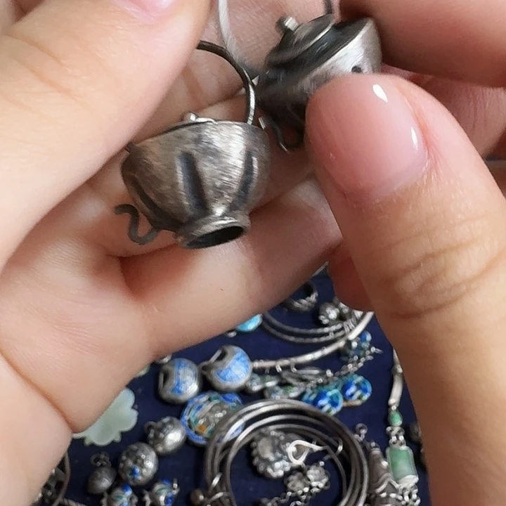 琳****无非金属把把壶吊坠