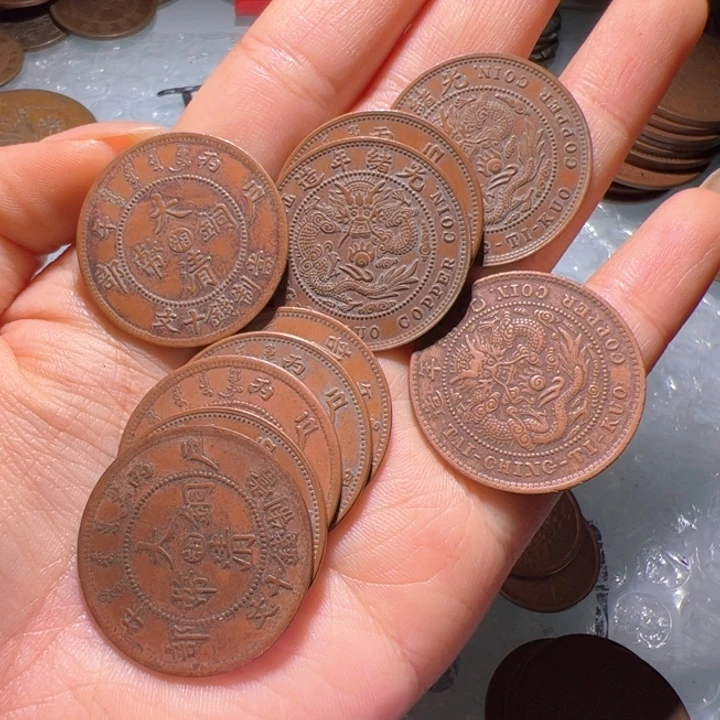 苏***晓十个铜币工艺品摆件