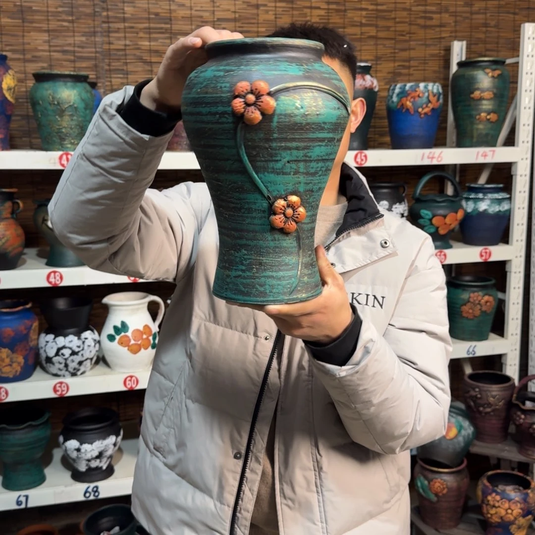 红陶浮雕花盆炸炸炸了