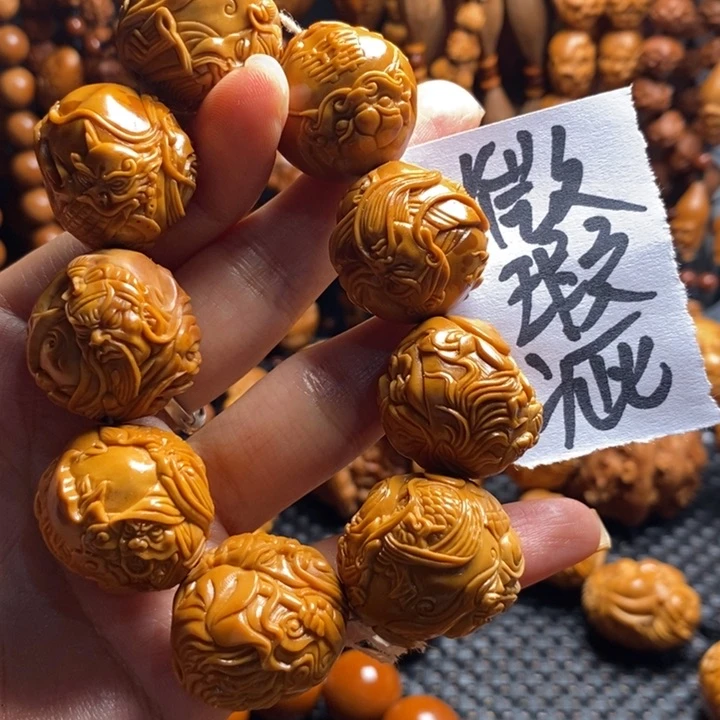 橄榄核吊坠鹏**微上色御龙关公