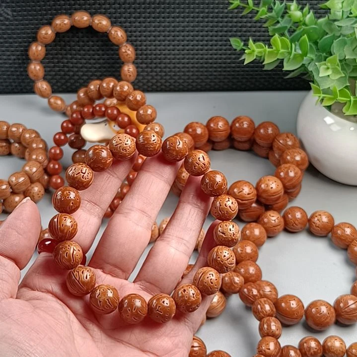 এ***এ桃核手串铁籽密纹满花