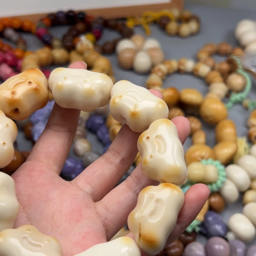 蓝***儿菩提根/象牙果吊坠Q829云朵25-31瑕疵一串