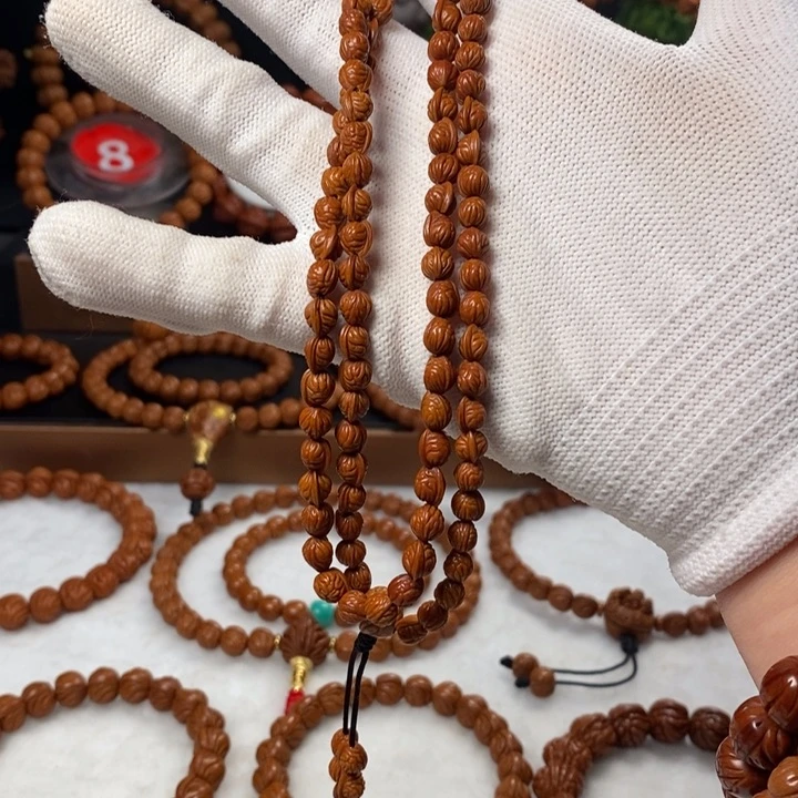 桃核吊坠闪***仗秦岭龙纹