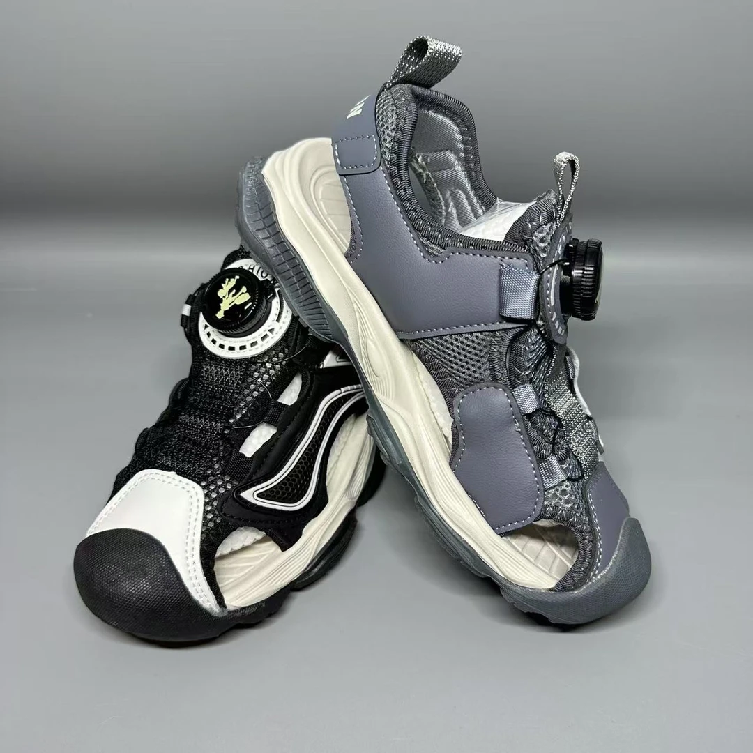 2915817儿童夏季爸爸总动员旋转扣包头沙滩凉鞋韩版男女童休闲运