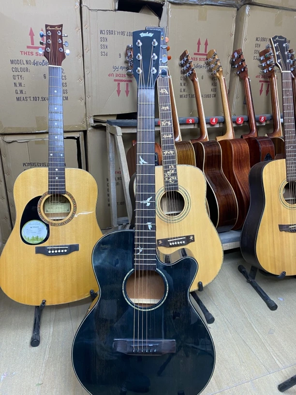 黑色单板吉他民谣木吉他瑕疵处理