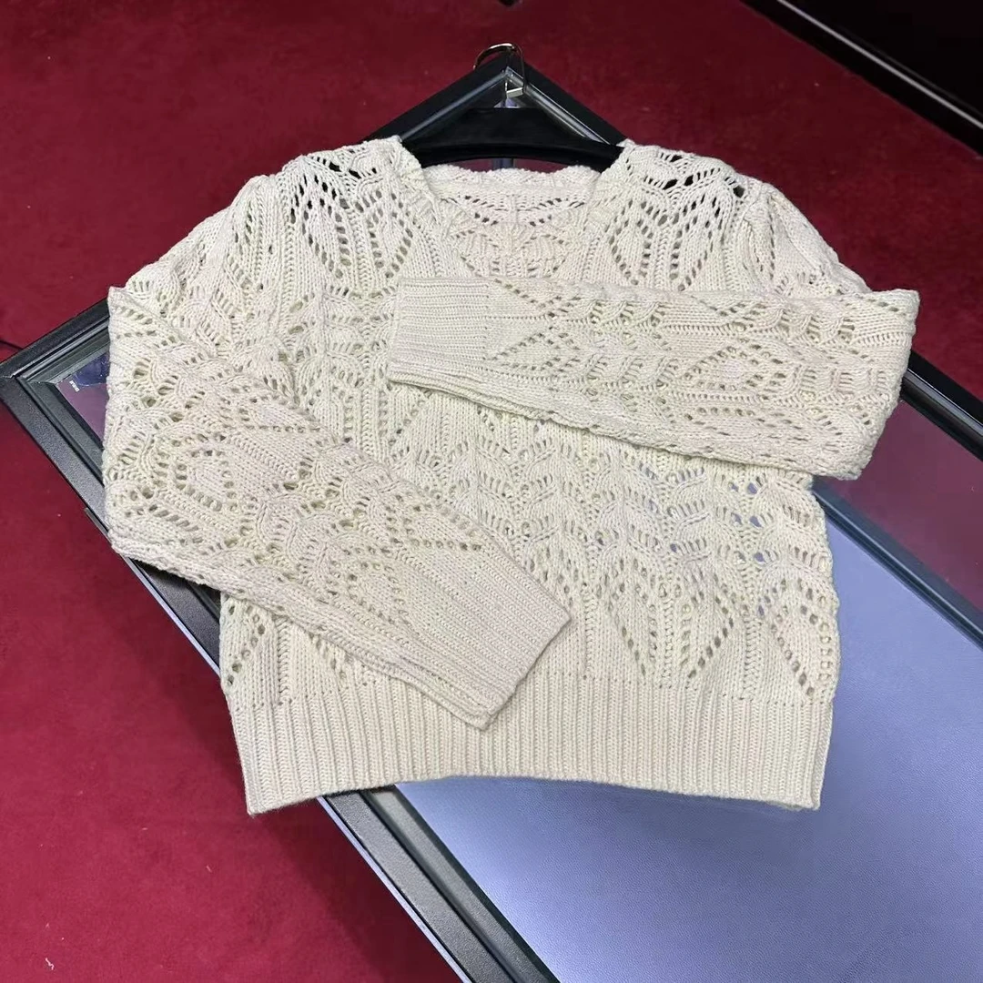 F593新款时尚针织长袖白色休闲镂空圆领烫钻