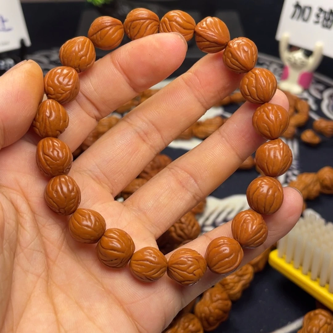 扶***。手串桃核龙纹桃核29