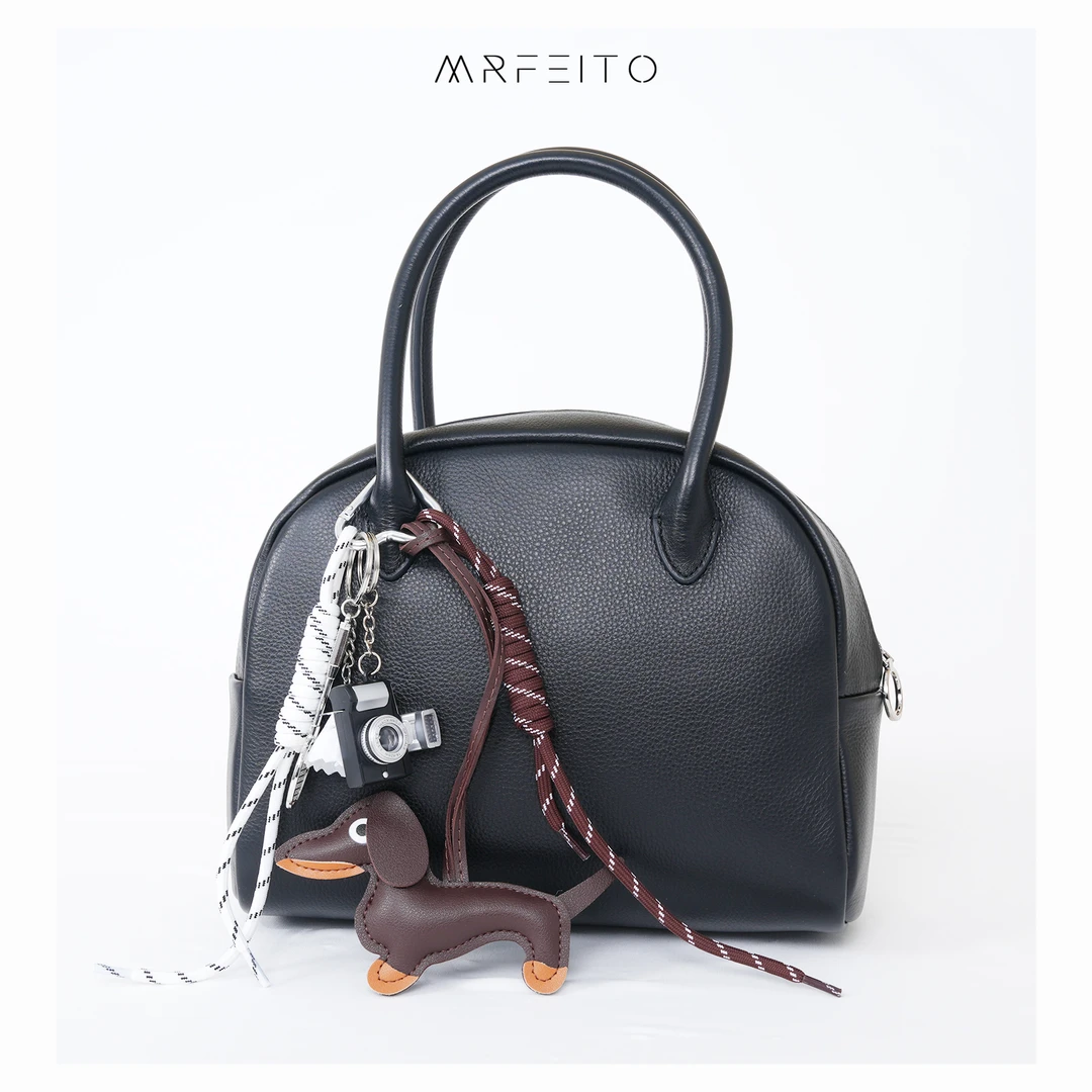 女士纯色卡通吊坠休闲包包H26BB30647