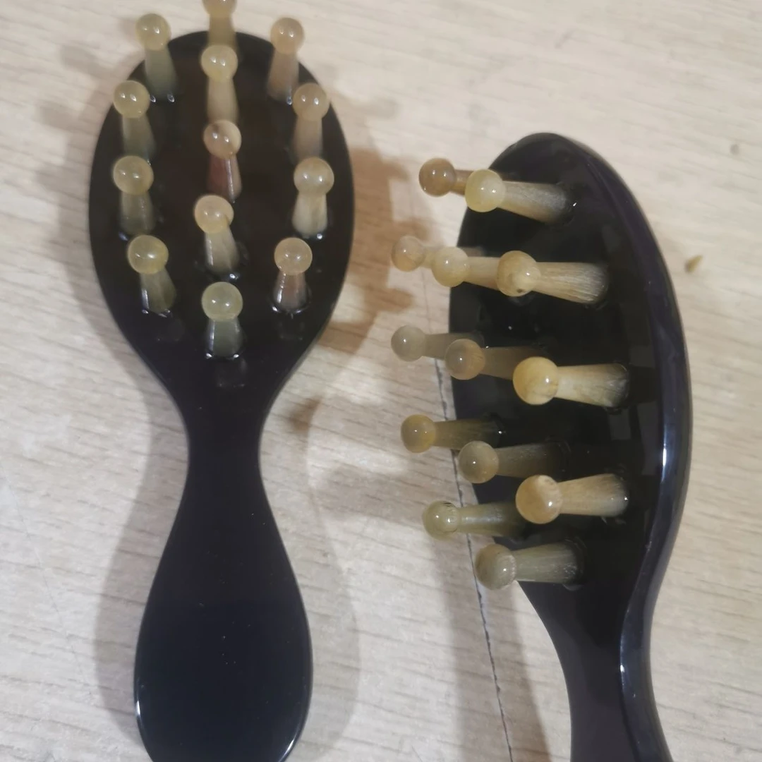 椭圆手柄洗头按摩梳子圆钉梳13钉按摩梳牛角齿牛角钉树脂手柄