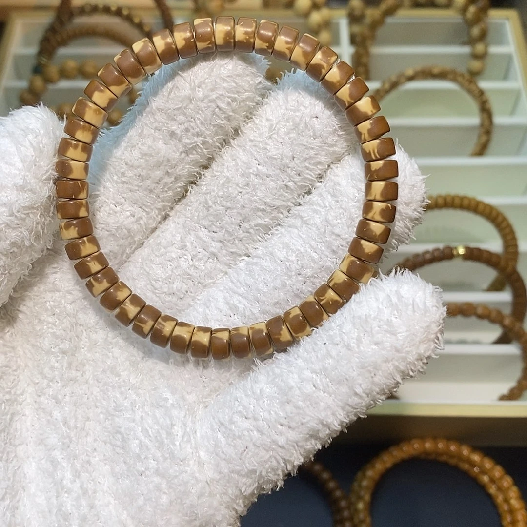 徐***龙紫金鼠手串花皮熊猫药片7*4