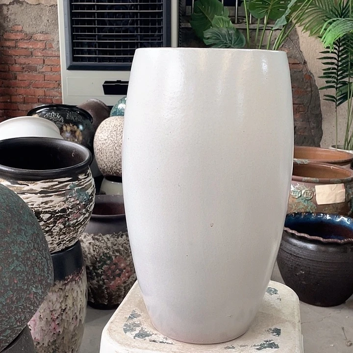 紫砂花盆正品口19高38。