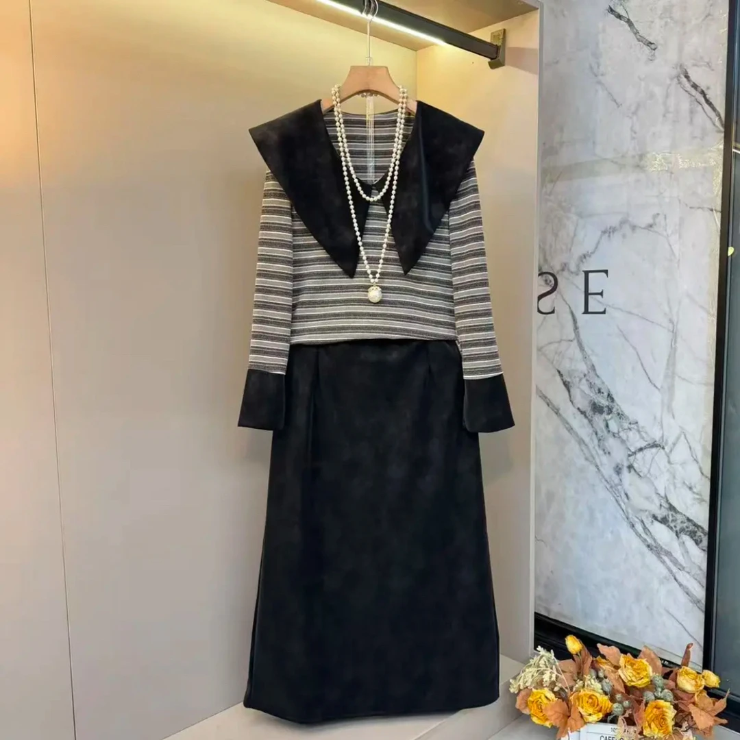 【晴儿家】秋季时尚韩版娃娃领条格上衣+后开叉半身裙两件套8920