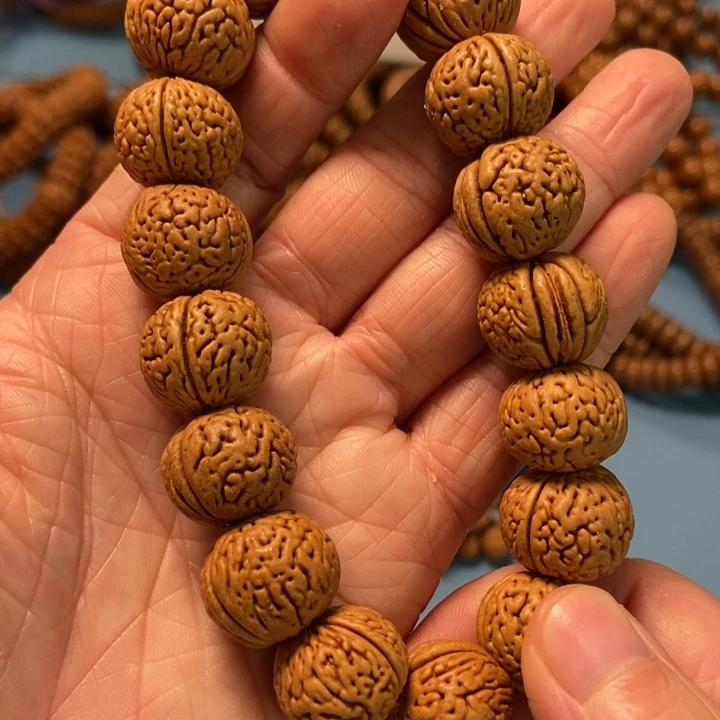 【闪购商品】桃核吊坠虎皮肥脐桃核