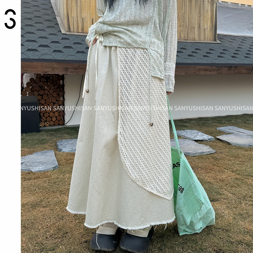 三与十三|海盐白沙|春季新款镂空绑带网纱简约设计感磨边A字半裙