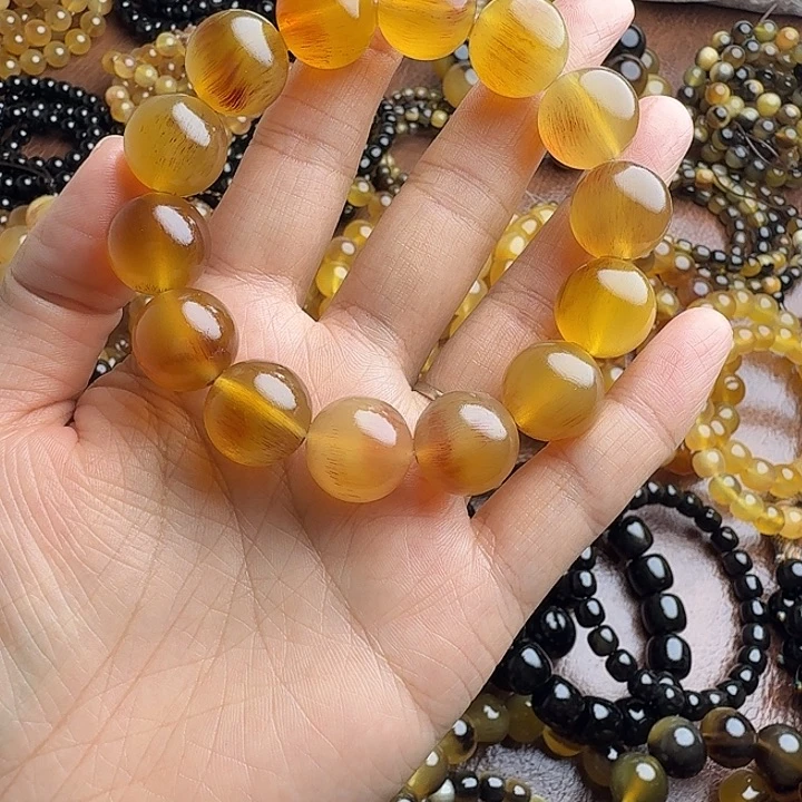 太***光木质类驴蹄子蜜色血料1.6手串