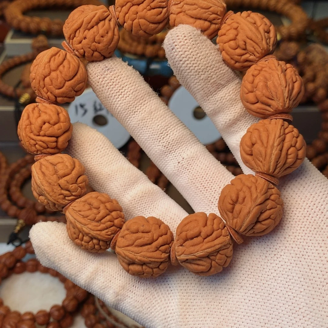 用***9手串桃核秦岭龙纹