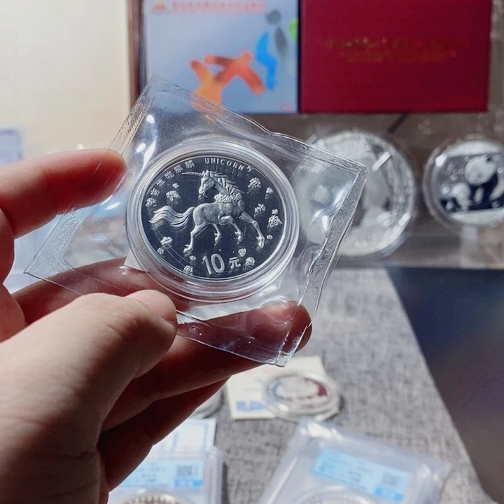 纯银97年麒麟裸币一枚如图