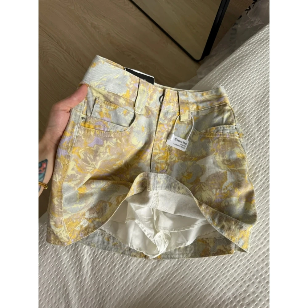 美式浅春系设计感小众牛仔裙女2025春夏新款高腰显瘦黄色半身裙子