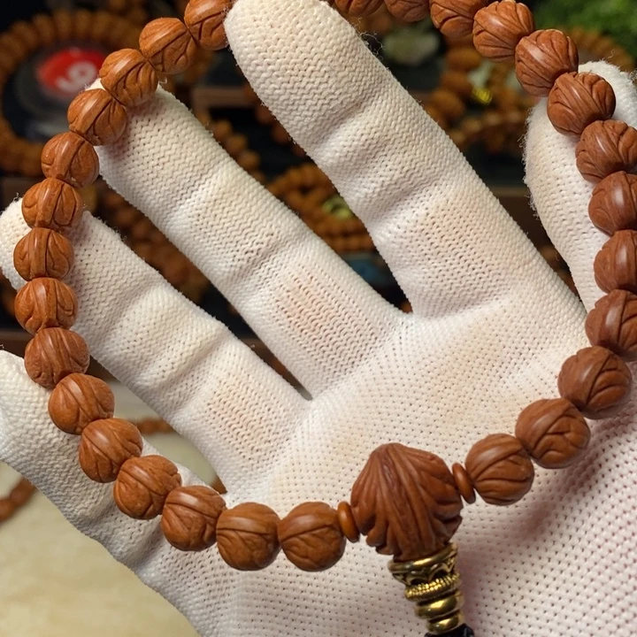 卡***妈桃核手串秦岭龙纹桃核