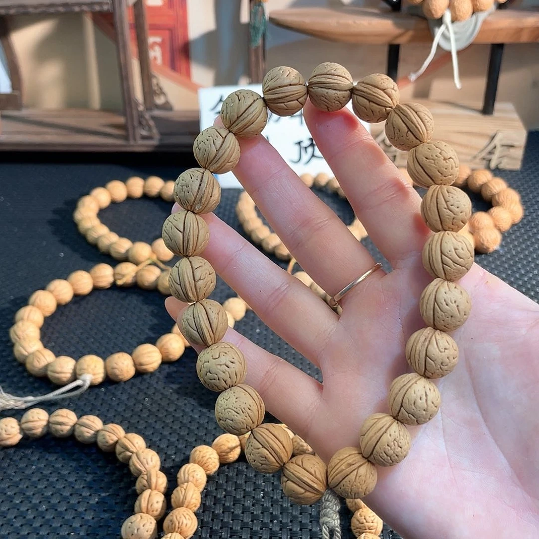 树脂制品L****a14加野生黄桃单圈手持