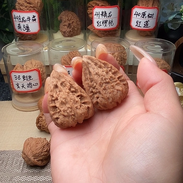 隋***文玩核桃把件塔尖……