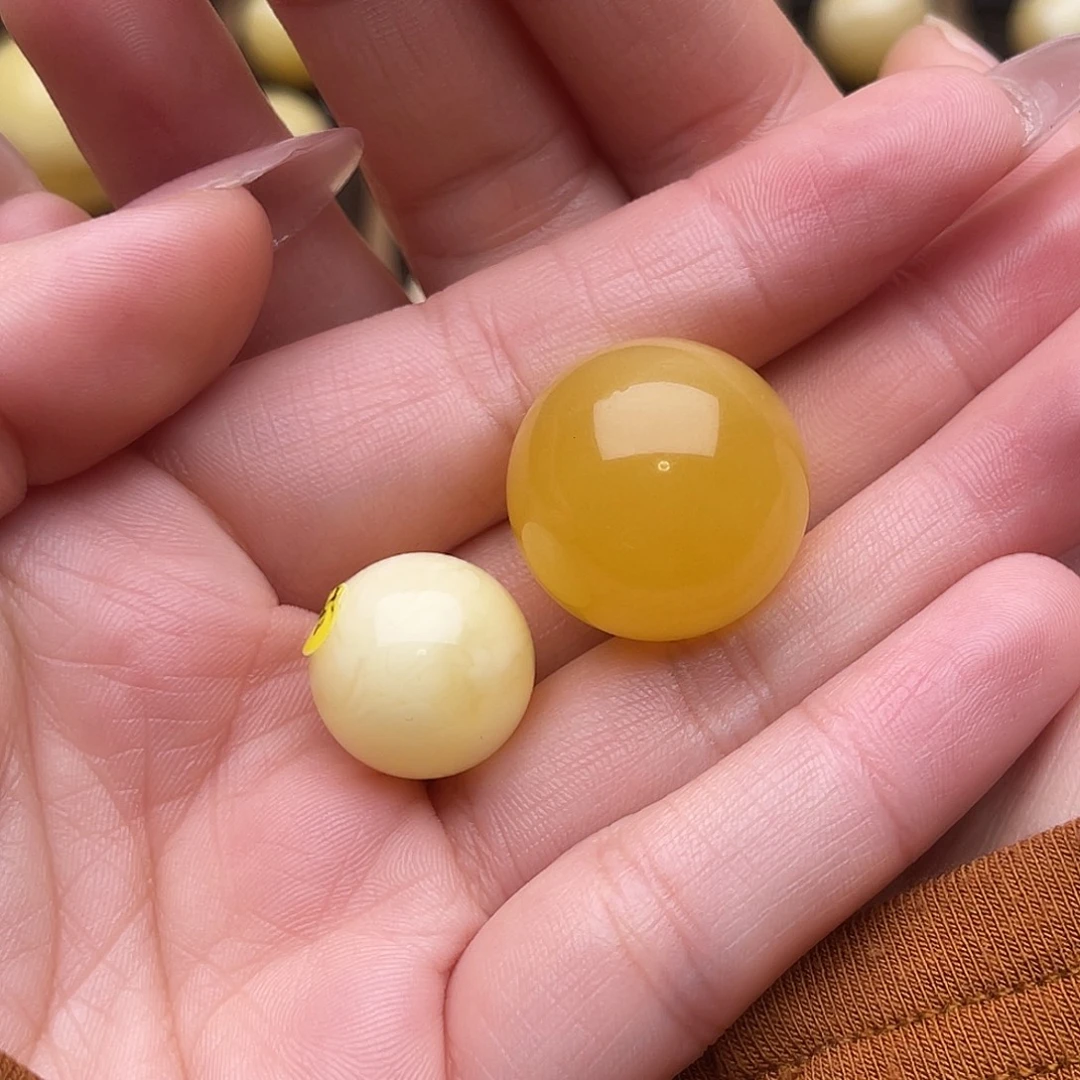 N***y琥珀未镶嵌裸石蜜蜡圆珠梦