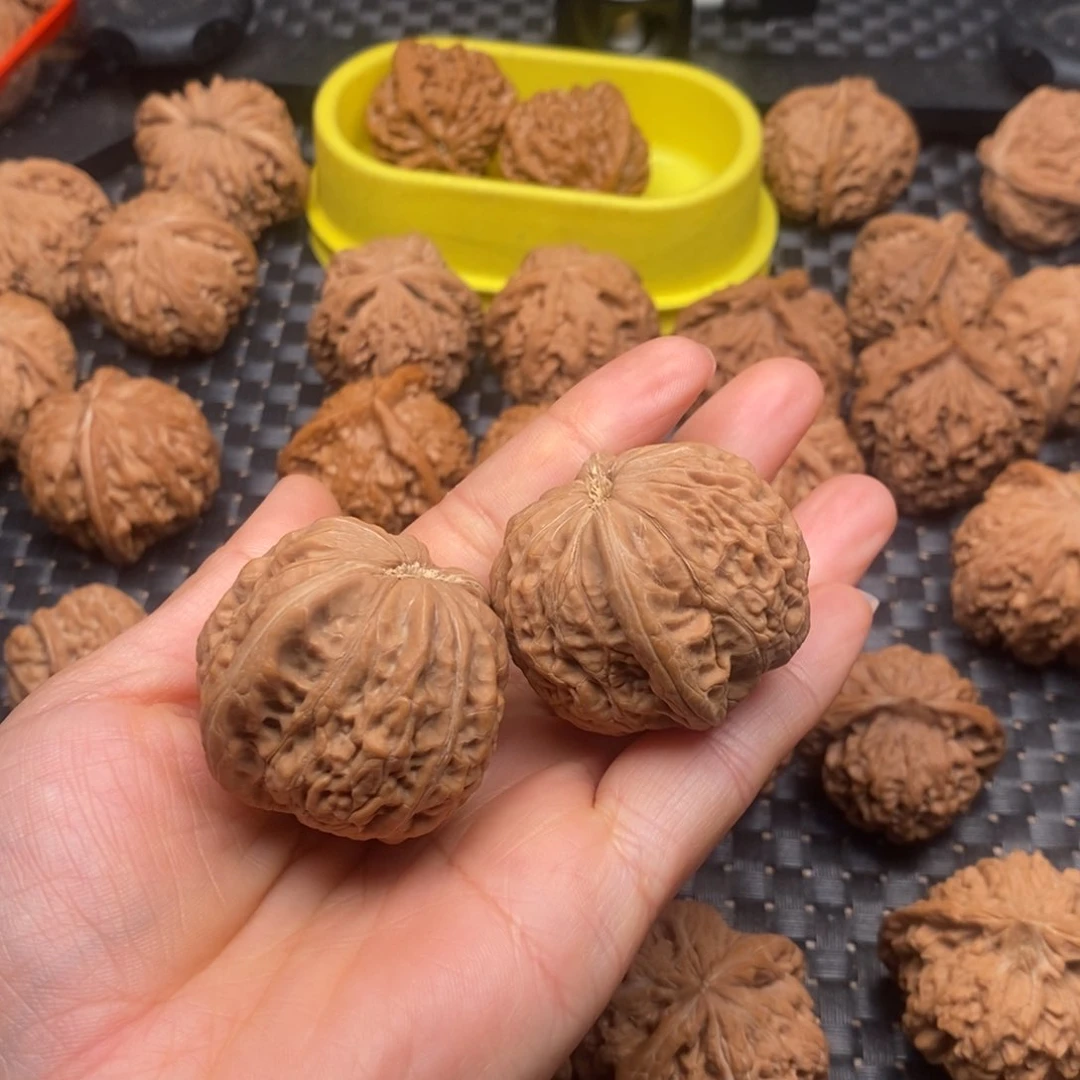 吊坠桃核哈*起文玩核桃