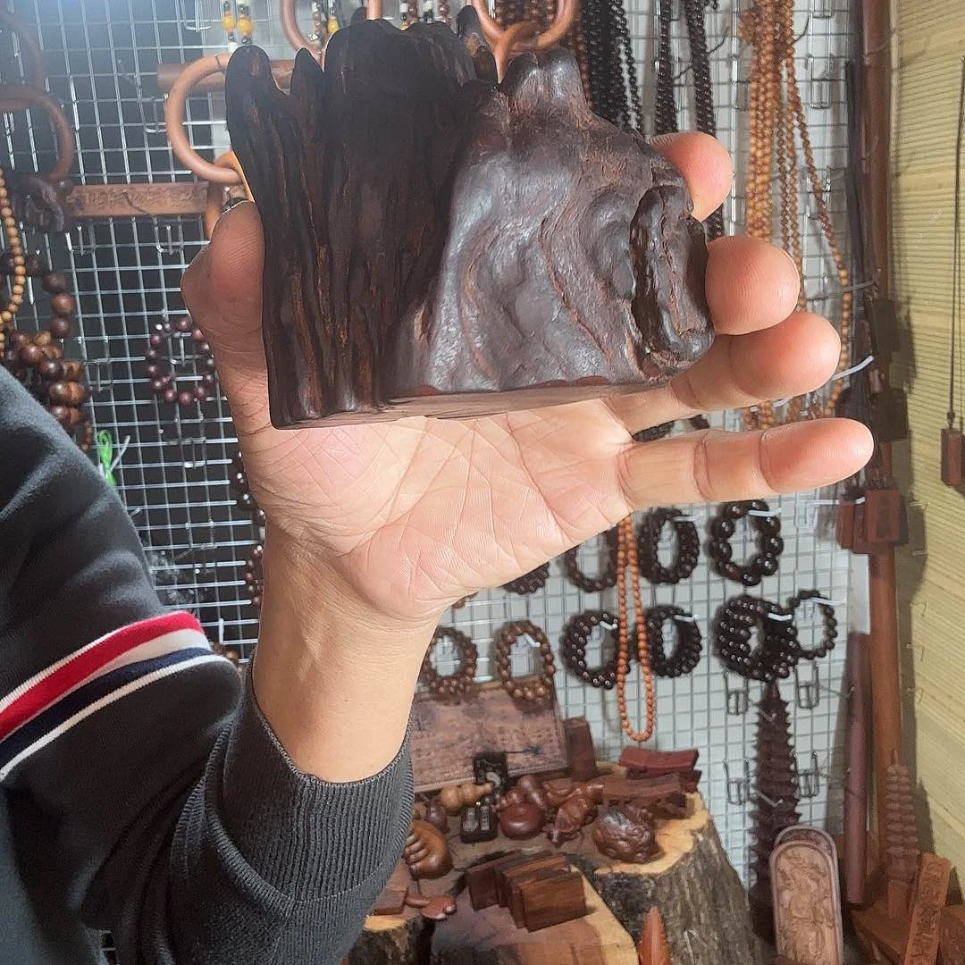 张***店百年雷击枣木手把件