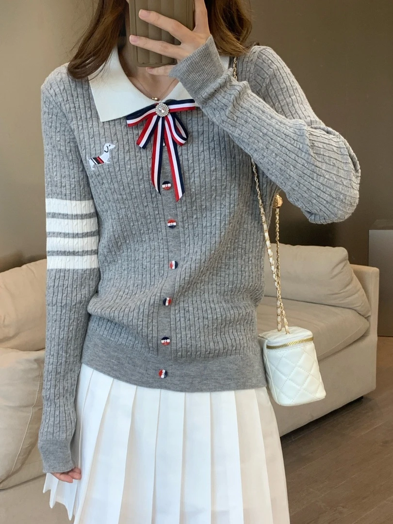 秋季学院风polo领撞色长袖针织衫女设计感蝴蝶结刺绣翻领显瘦上衣