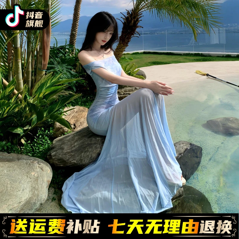 2025新款法式蓝色一字肩薄纱连衣裙子女夏季海边度假气质包臀长裙