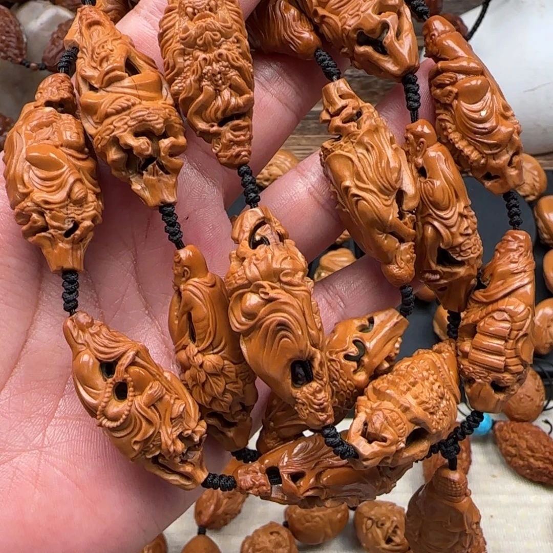 橄榄核手串郭**来橄榄手工制作工艺