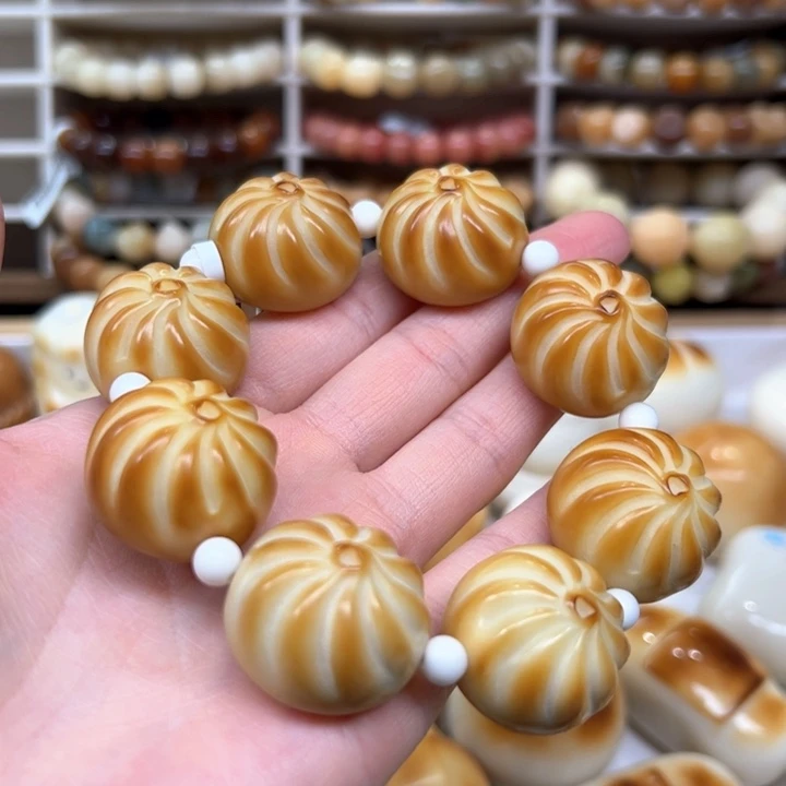 白玉菩提把件1.21.46象牙果烤包子