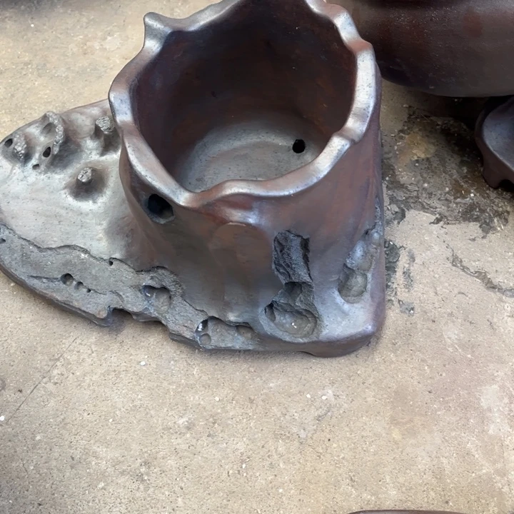 元***爹紫砂花盆宜兴紫砂工艺厂。