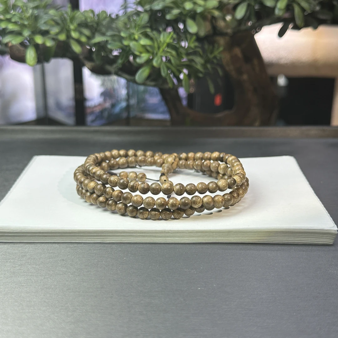 ZYCX-2330 达拉于0.5黄油格多圈7.3g 约：5mm*144颗
