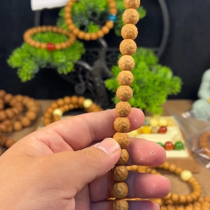 桃核吊坠猴头批发