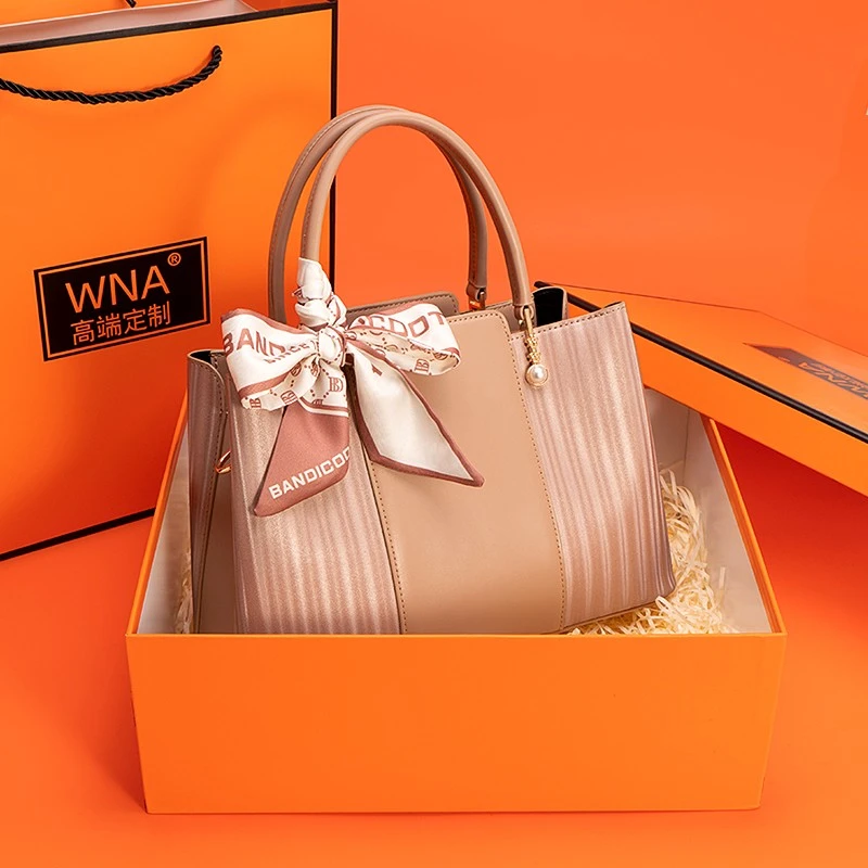 减龄粉包包女2025新款气质手提包婚包大容量送妈妈中年生日礼物