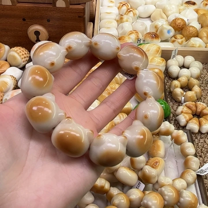 把件菩提根/象牙果12.21.19象牙果炭烤猫头瑕