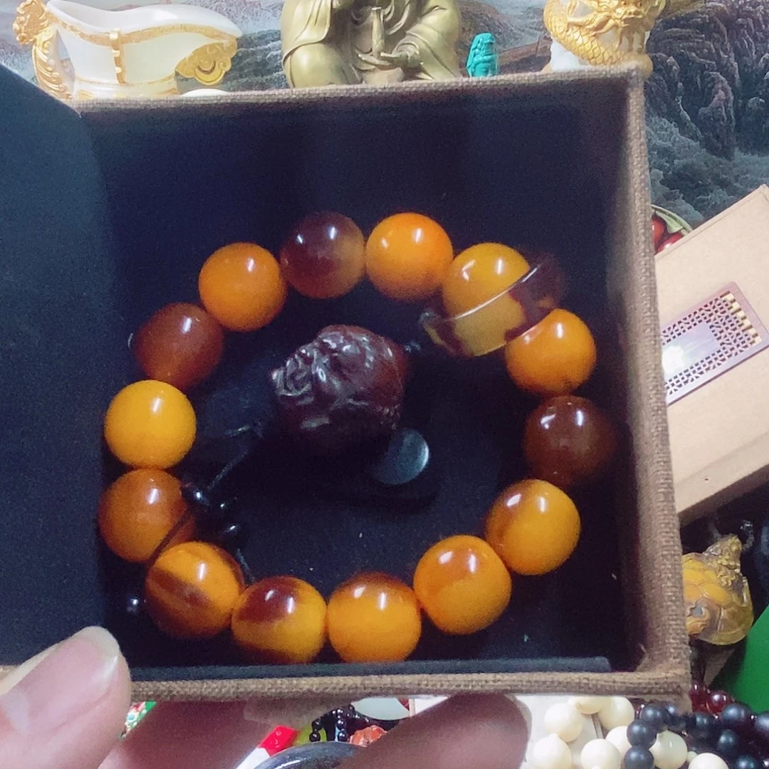 织绣老*子摆件设计的时候也是很有创意