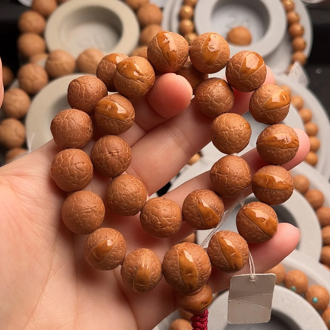 凤眼菩提吊坠13.5手持