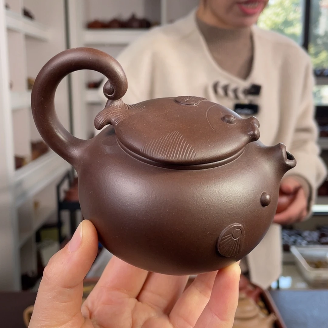 紫砂茶壶孟****园老紫泥半提梁鱼270cc