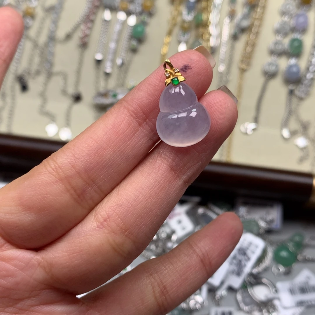 杨***丁翡翠18K金镶嵌戒指吊坠