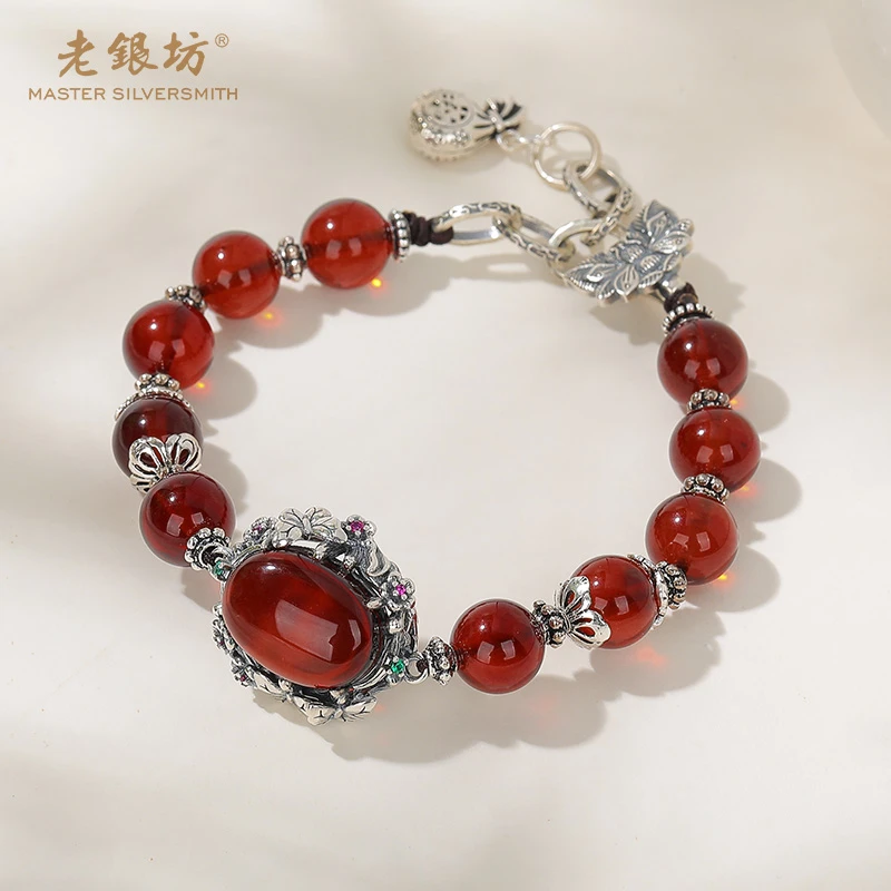 s925银繁花蝶欢血珀手链 00331303