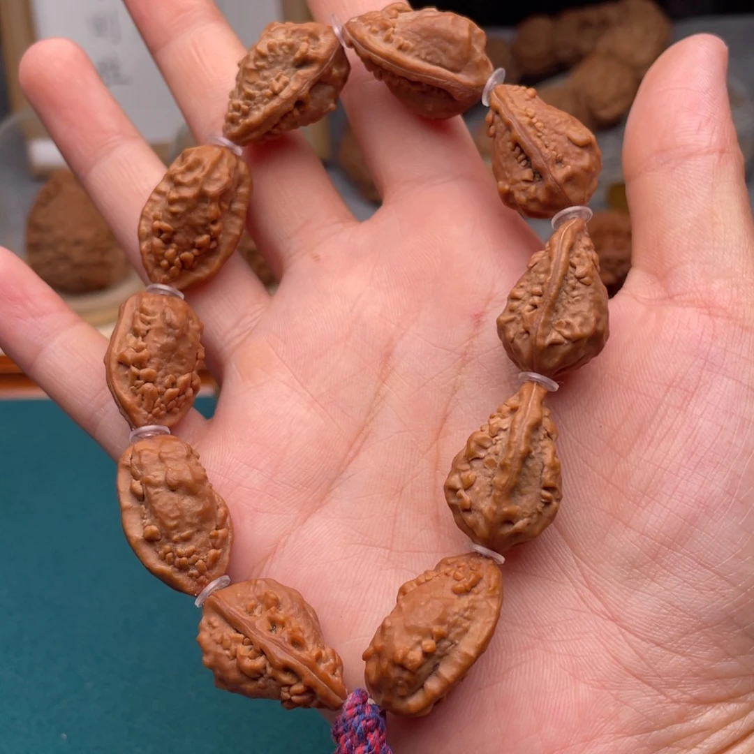 文玩核桃吊坠麒麟角手串