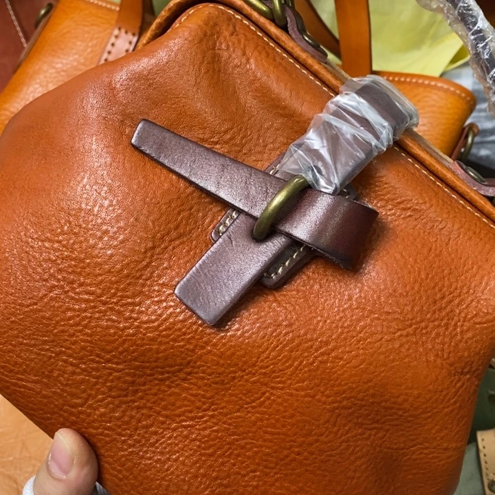 头层牛皮瑕疵单肩包