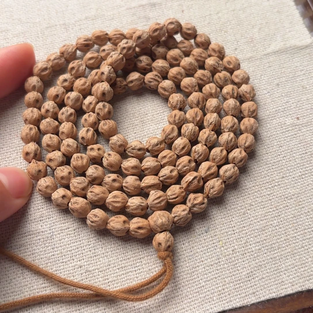 栀***开柏香籽/百香籽吊坠