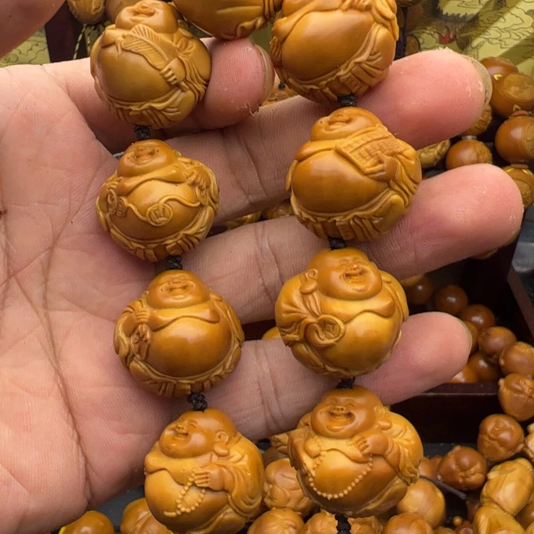 用***5橄榄核吊坠2.4大肚米勒