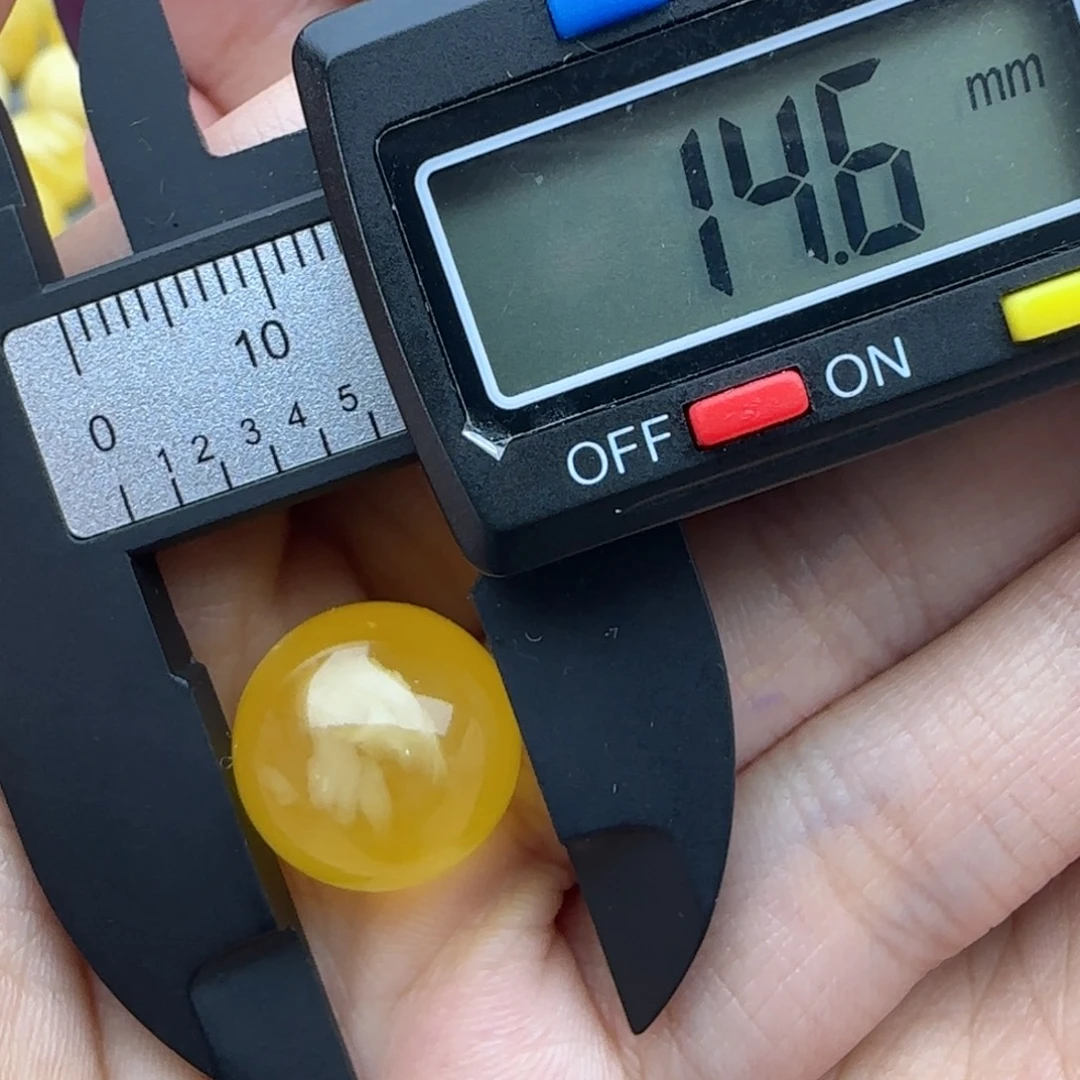 飞****蜜蜡未镶嵌裸石微瑕飘花圆珠